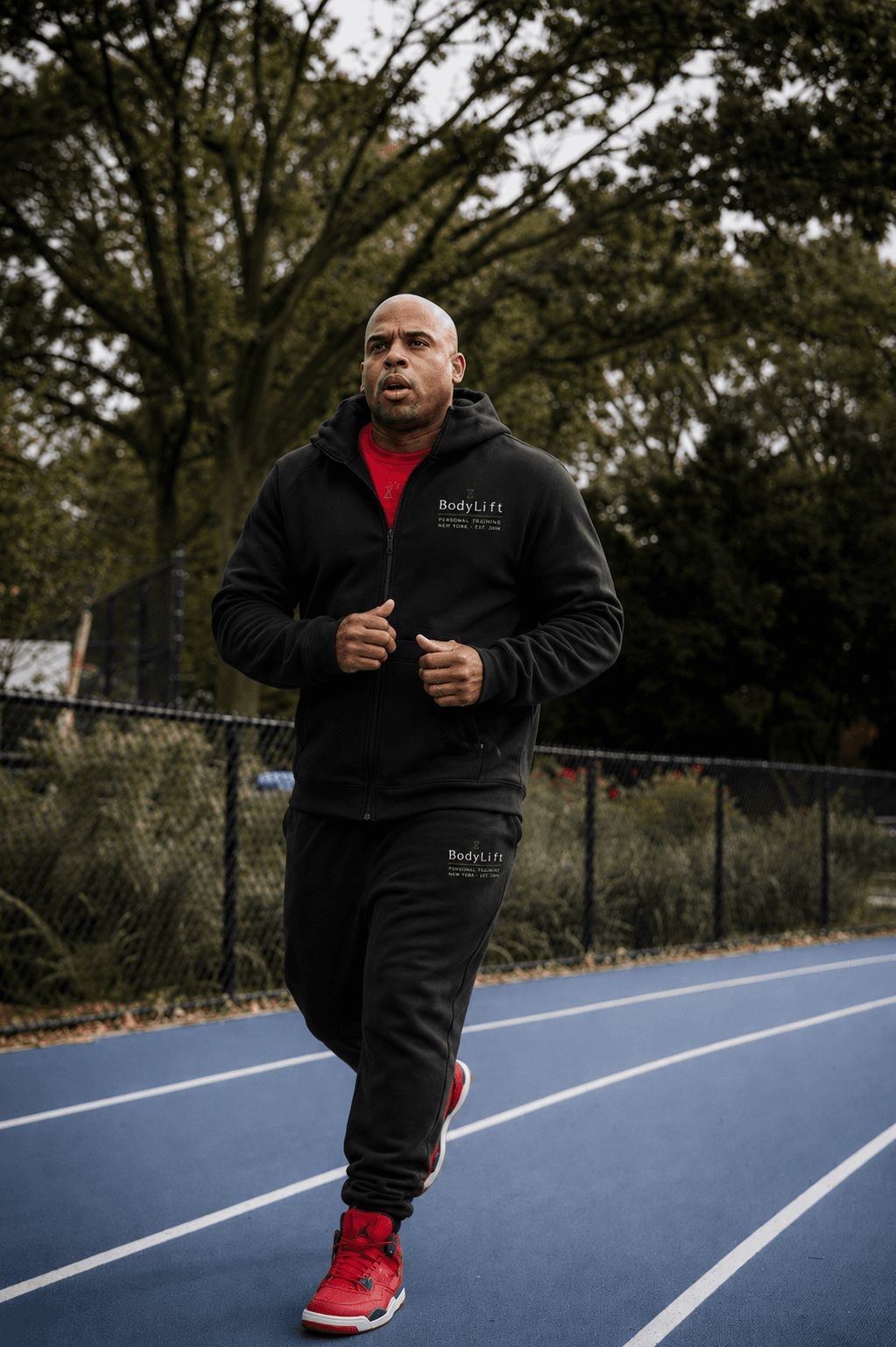 Andre running on the track
